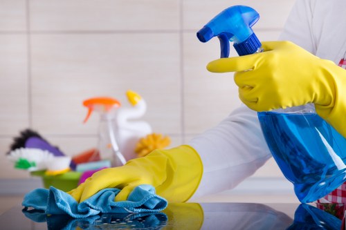 Team reviewing safety procedures in a cleaning environment